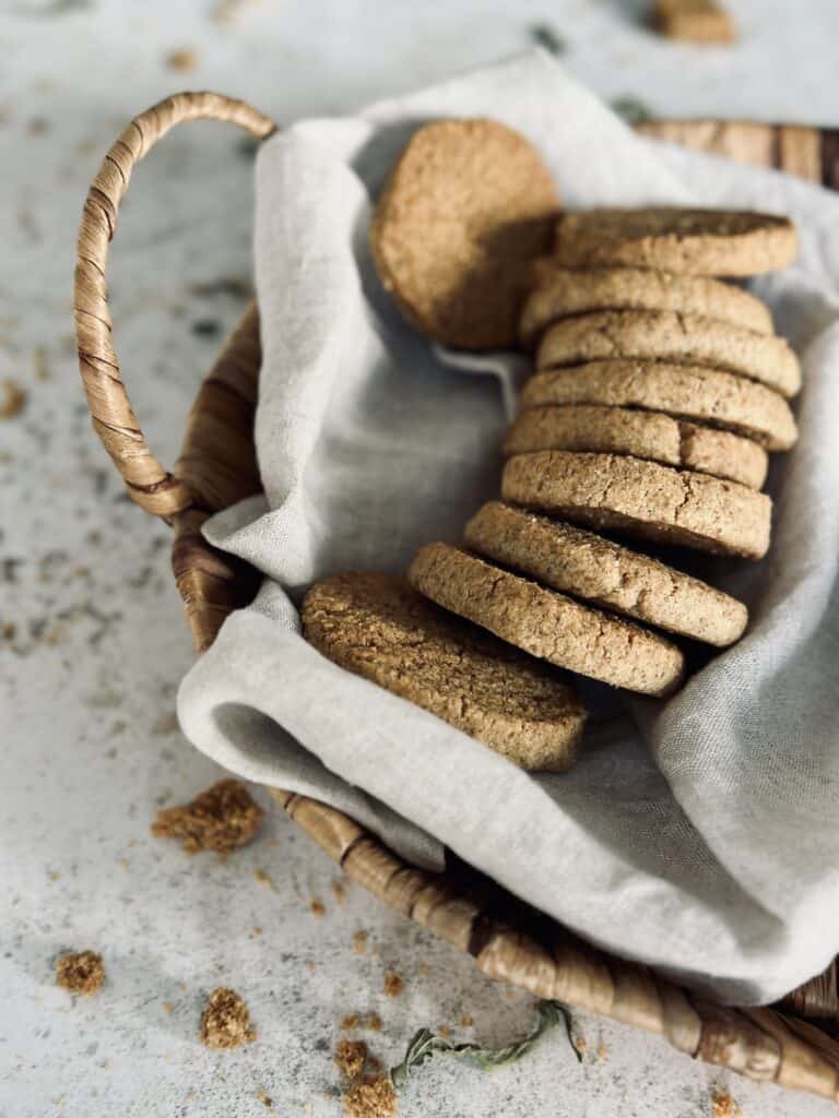 Rustic cookies laid in a wicker basket