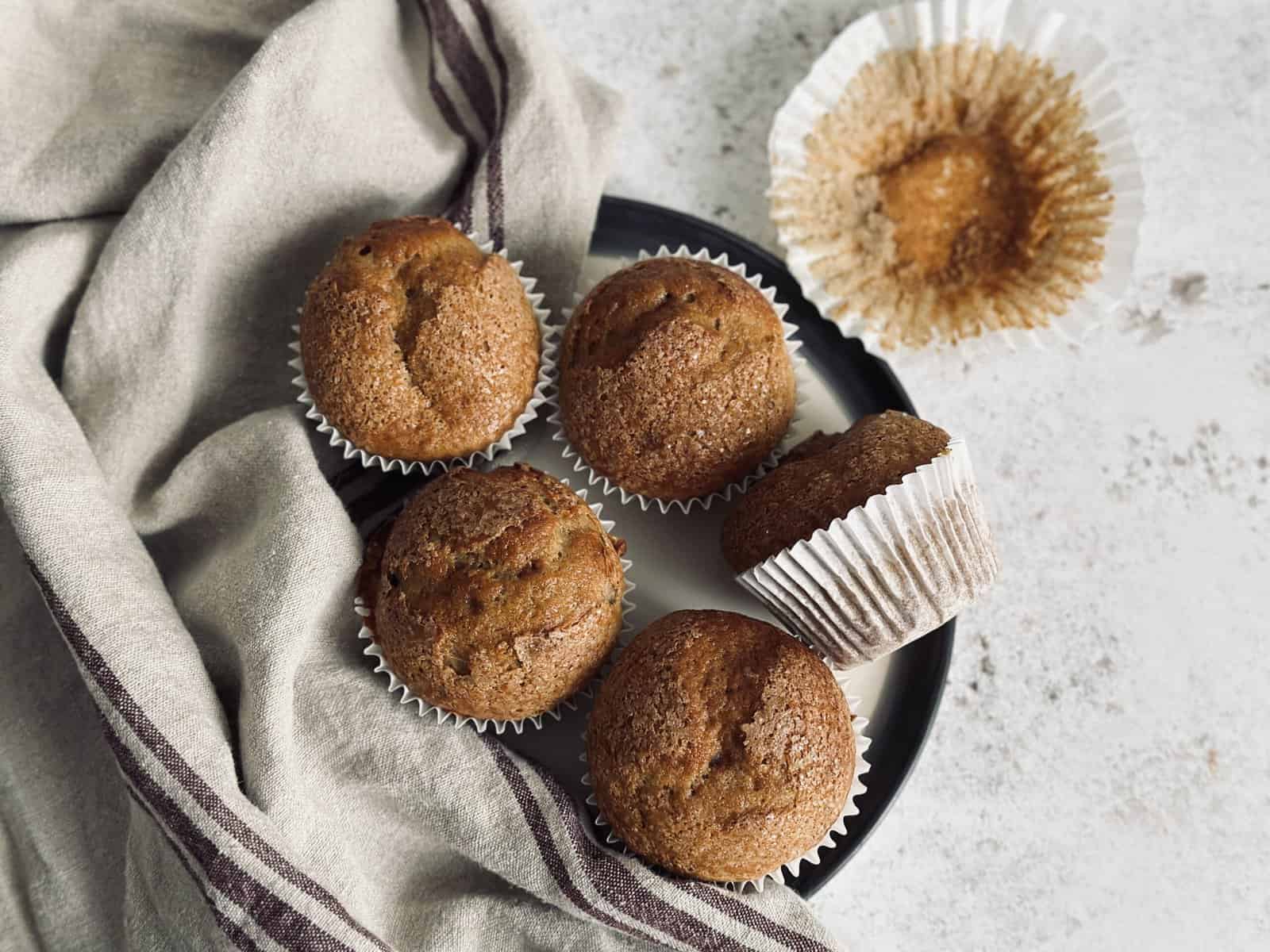 A plate full of sourdough banana and cottage cheese muffins.