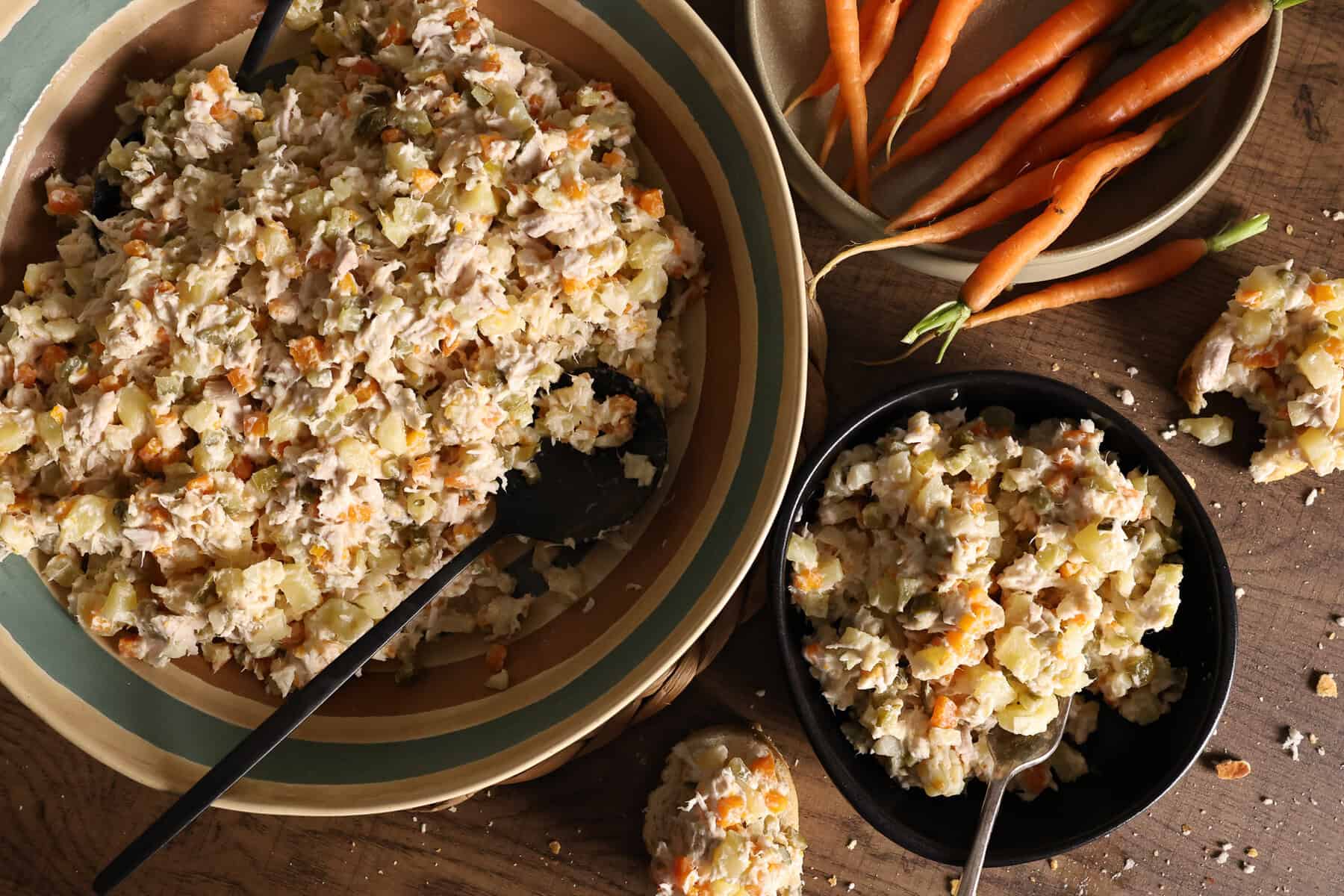 two bowls of chicken pickle and root vegetable salad