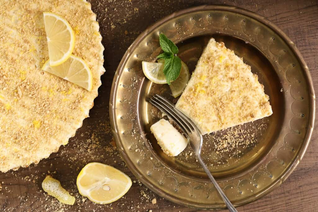 A slice of frozen whipped lemonade pie