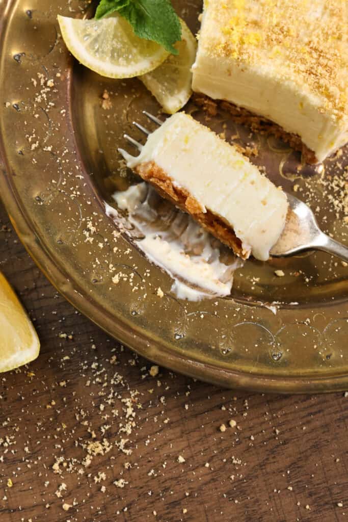 A slice of no-bake lemon cheesecake.