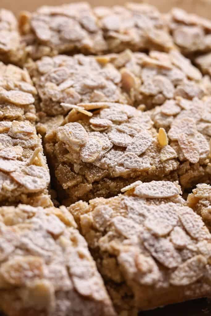 Close-up of a tray of almond croissant cookie bars.
